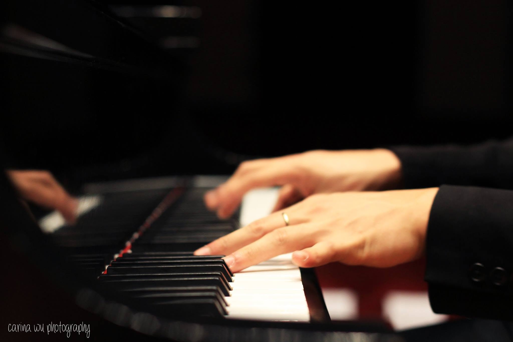 Stephen Joven-Lee’s hands at a grand piano